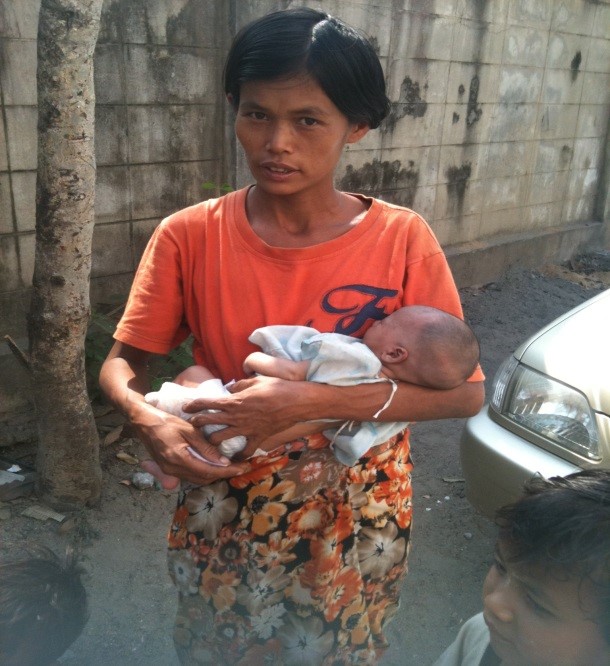 Burmese woman with her tiny baby