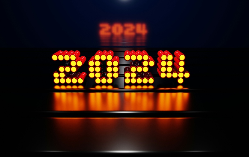 The year 2020 illuminated in neon lights, set against a dark backdrop